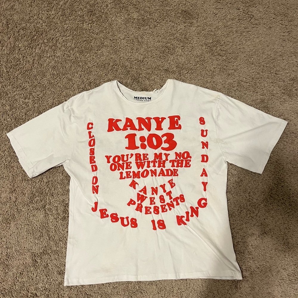 A white puff print Kanye Jesus shirt